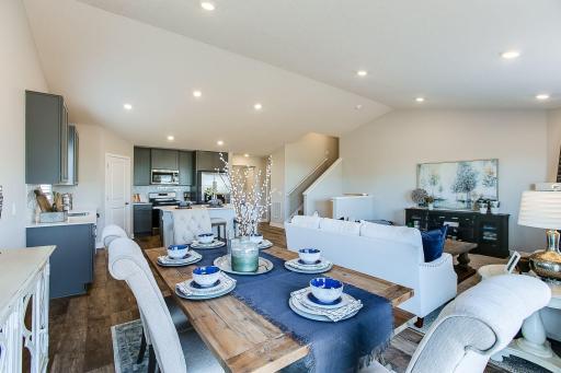 Spacious and well-lit dining area just off of the kitchen! *Picture is of model home; actual finishes may vary.