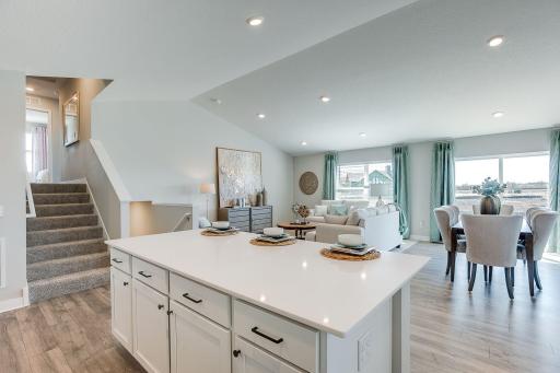 Vaulted ceilings, open floor plan and spacious are three words commonly used to describe the main level of the Finnegan. *Picture is of model home; actual finishes may vary.