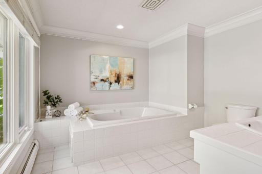 Tub and 2 sinks in master bath