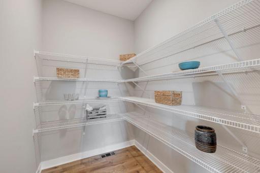 Abundant pantry space for food and small appliance storage.