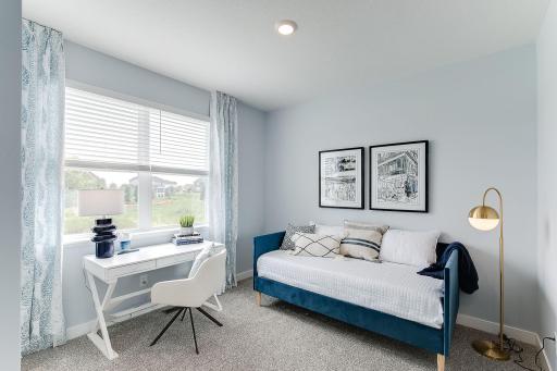 Main level bedroom perfect as a full time bedroom, guest bedroom or an office.