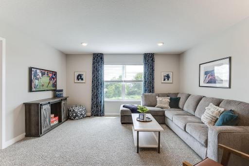 The upper-level loft provides an additional full size living space!
