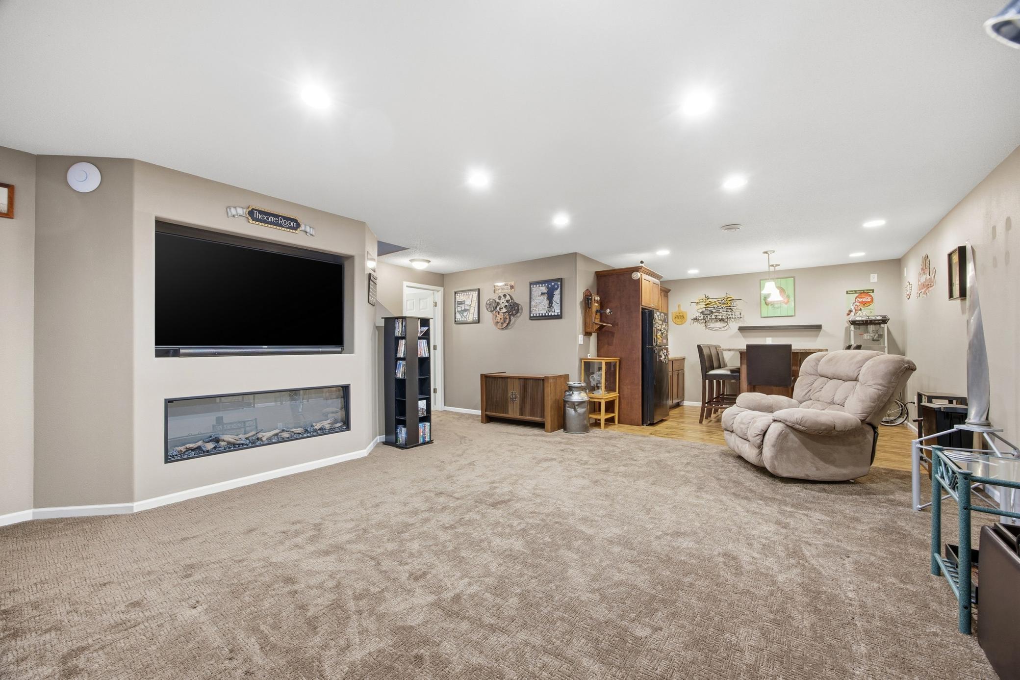 Basement Living Room - beautiful electric fireplace