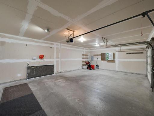 The ATTACHED 3 CAR GARAGE SURE TO PLEASE!!!