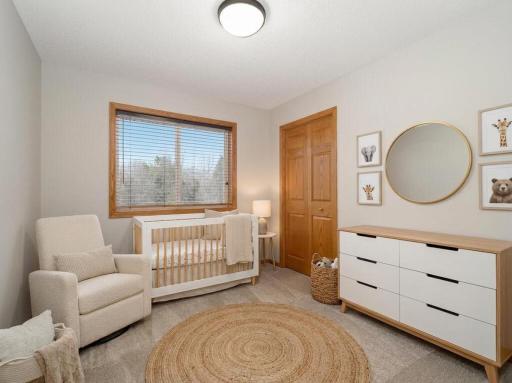 Bedroom #2 AI Staged as a Nursery...Could Easily Be a Home Office???