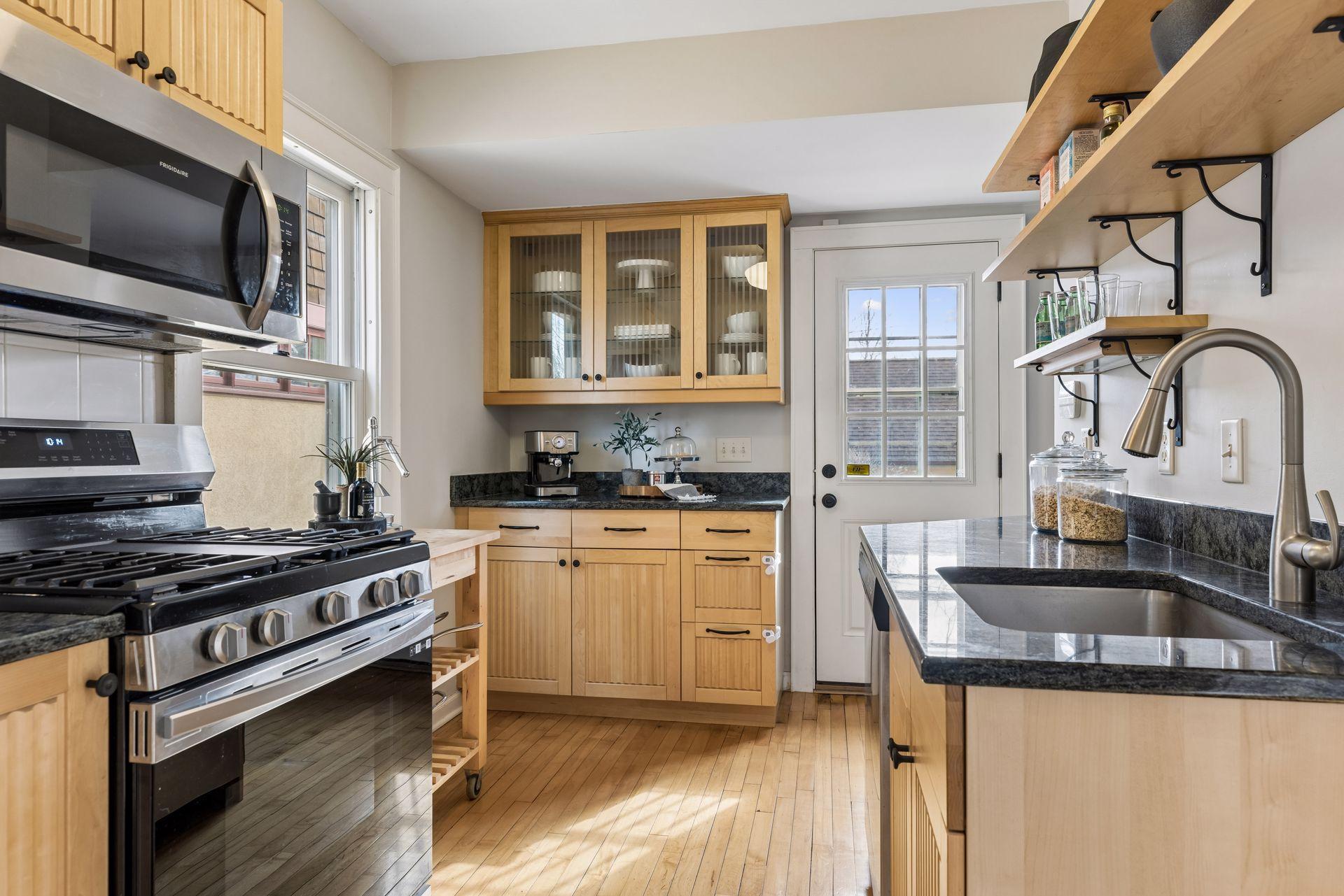 Kitchen is functional and features updated appliances