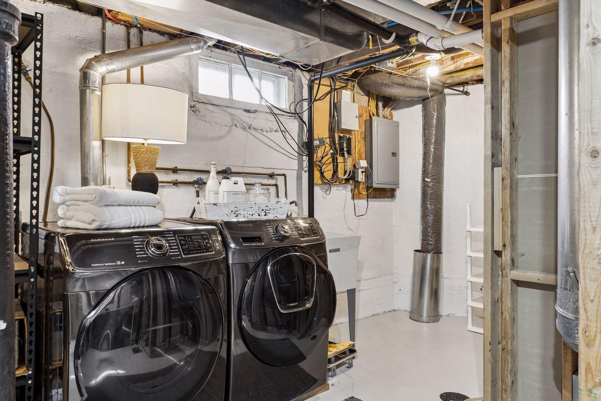 Laundry room in lower level offers great convenience