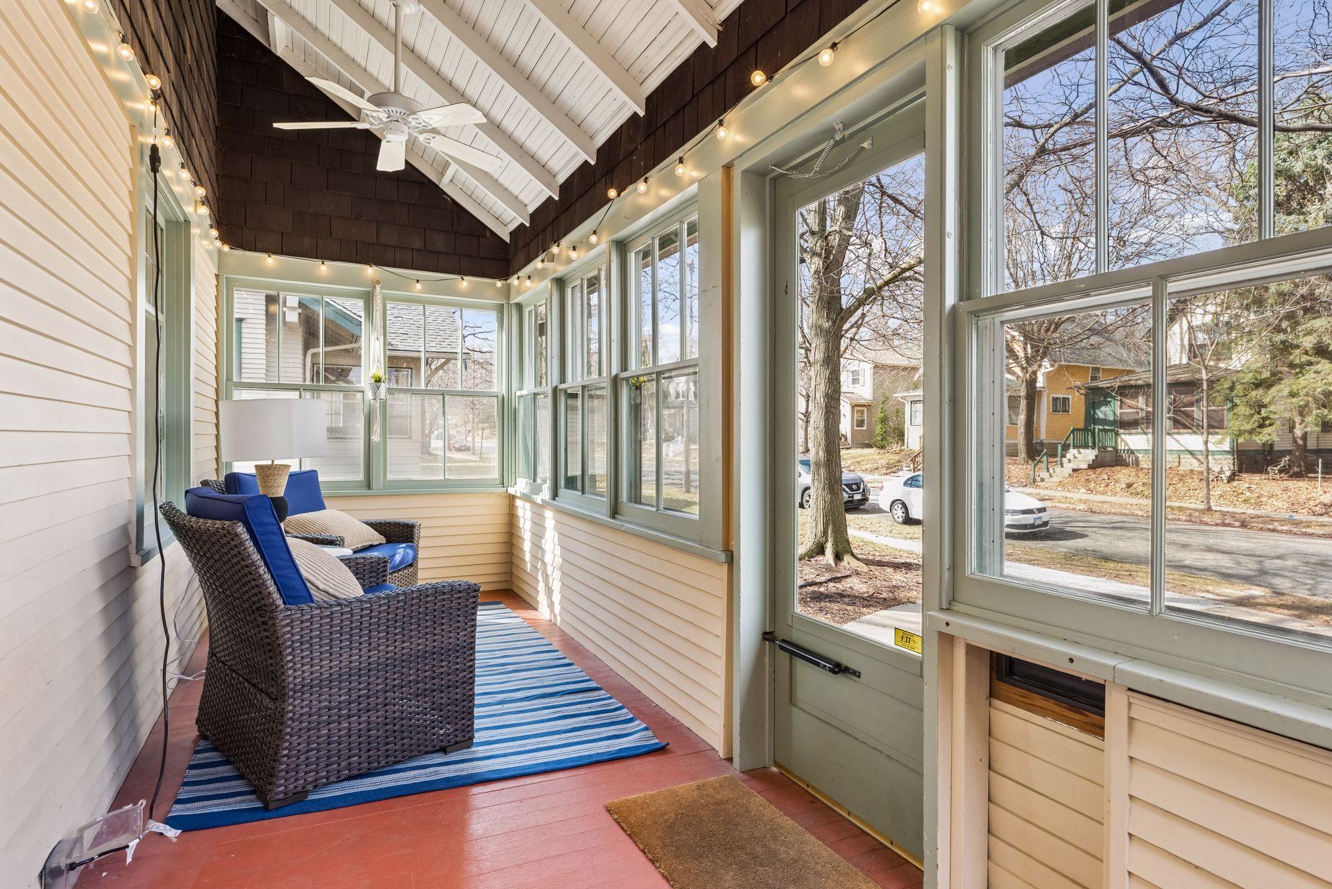 Front 3 season porch welcomes guests and doubles as a calm retreat