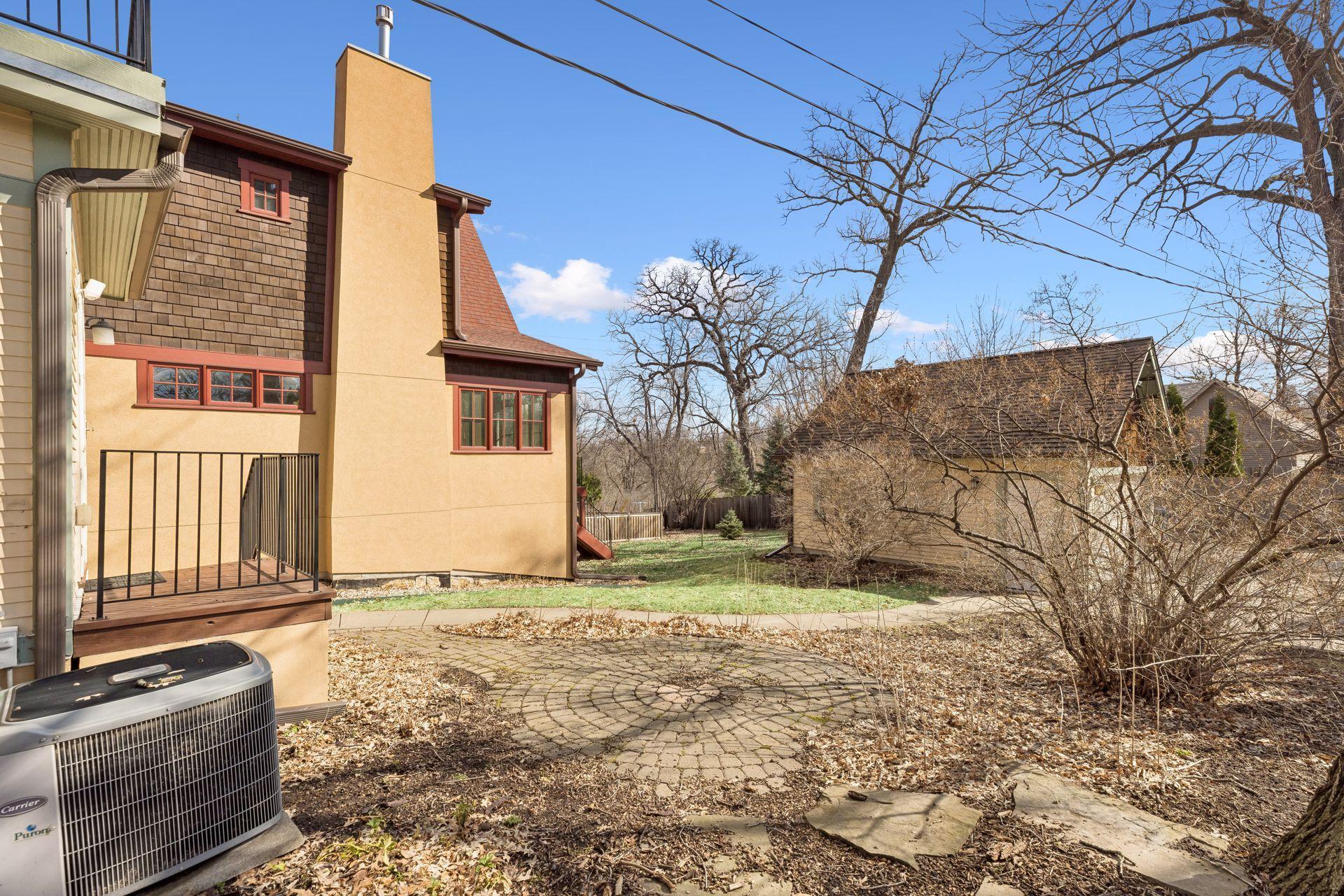 Paver patio in rear of home is yet another fantastic gathering space