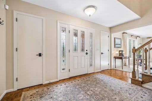 Spacious Entry with Attractive Front Door and two Coat Closets!