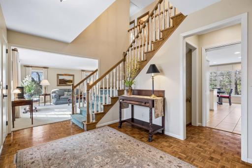 Parquet Floor and Open Stairway with a Custom Carpet Runner!