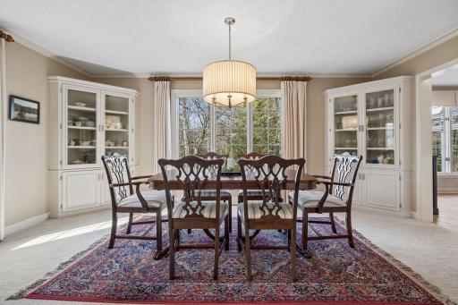 Elegant Formal Dining Room has two Built-in China Cabinets!