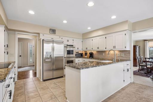 Updated Kitchen includes Kitchen Aide Elite Refrigerator and Double Dacor Ovens!