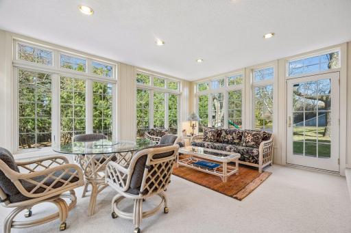 Bright and Sunny Sunroom is the perfect place for reading or dining in all seasons!