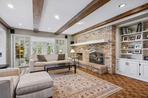 Brick Fireplace, Parquet Floor, and Beamed Ceiling adds warmth and character!