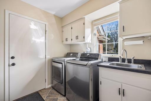 Main Floor Laundry/Mudroom has a large closet for all the gear! LG Washer/Dryer included!