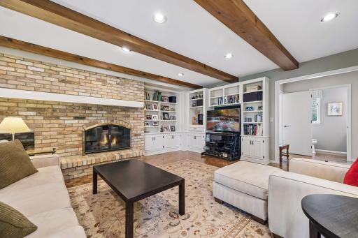 Cozy Family Room with Gas Fireplace and Built-in Bookshelves!