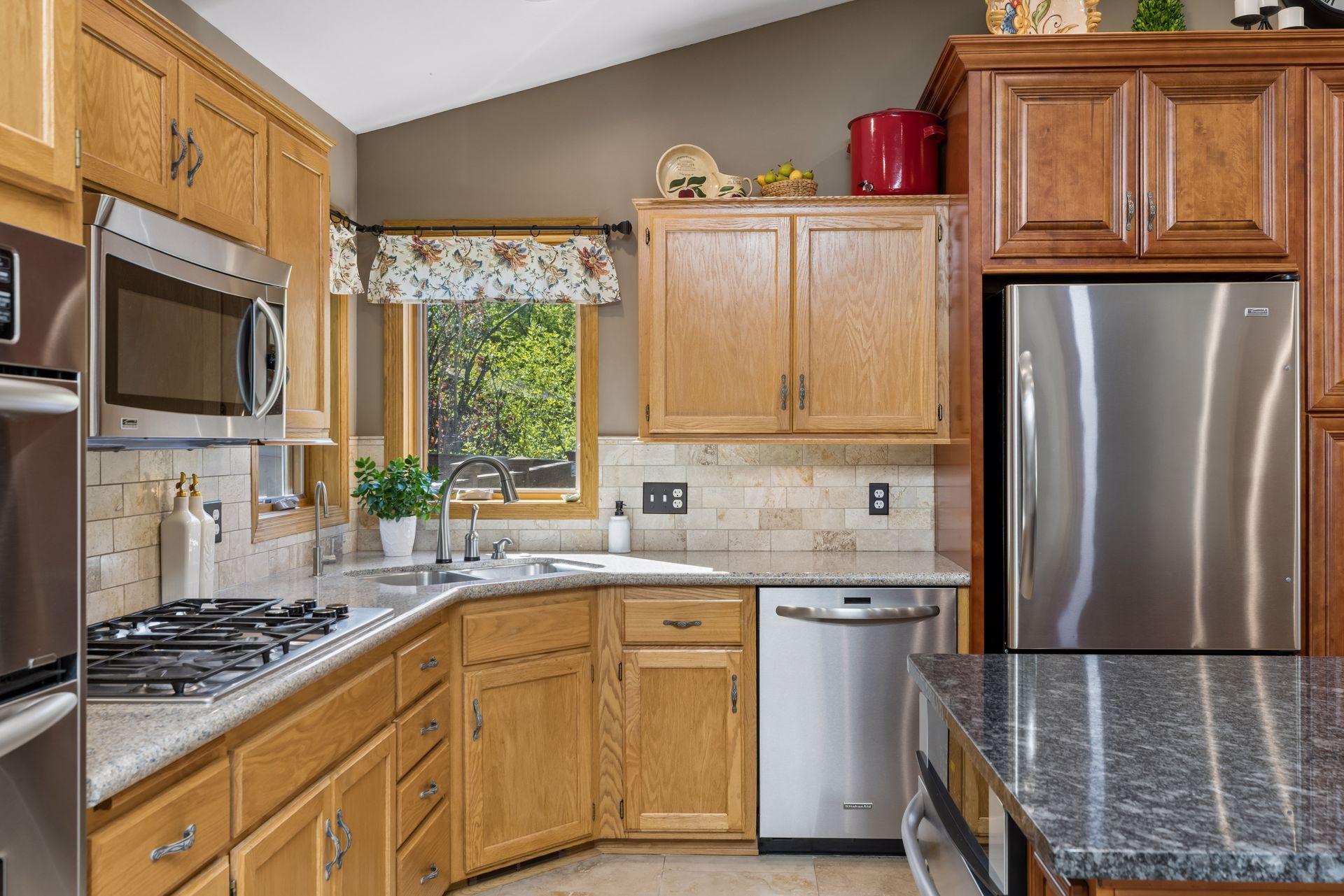 Rich wood cabinetry adds warmth and character
