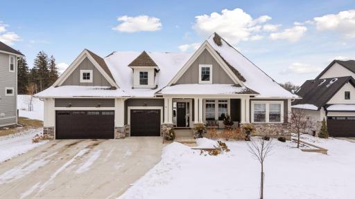 Introducing 24545 Bentgrass Way, nestled in the desirable Minnetonka Country Club neighborhood of Shorewood, Minnesota.