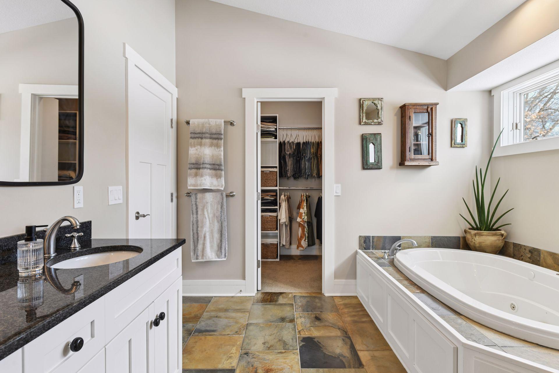 Primary en-suite with a walk-in closet