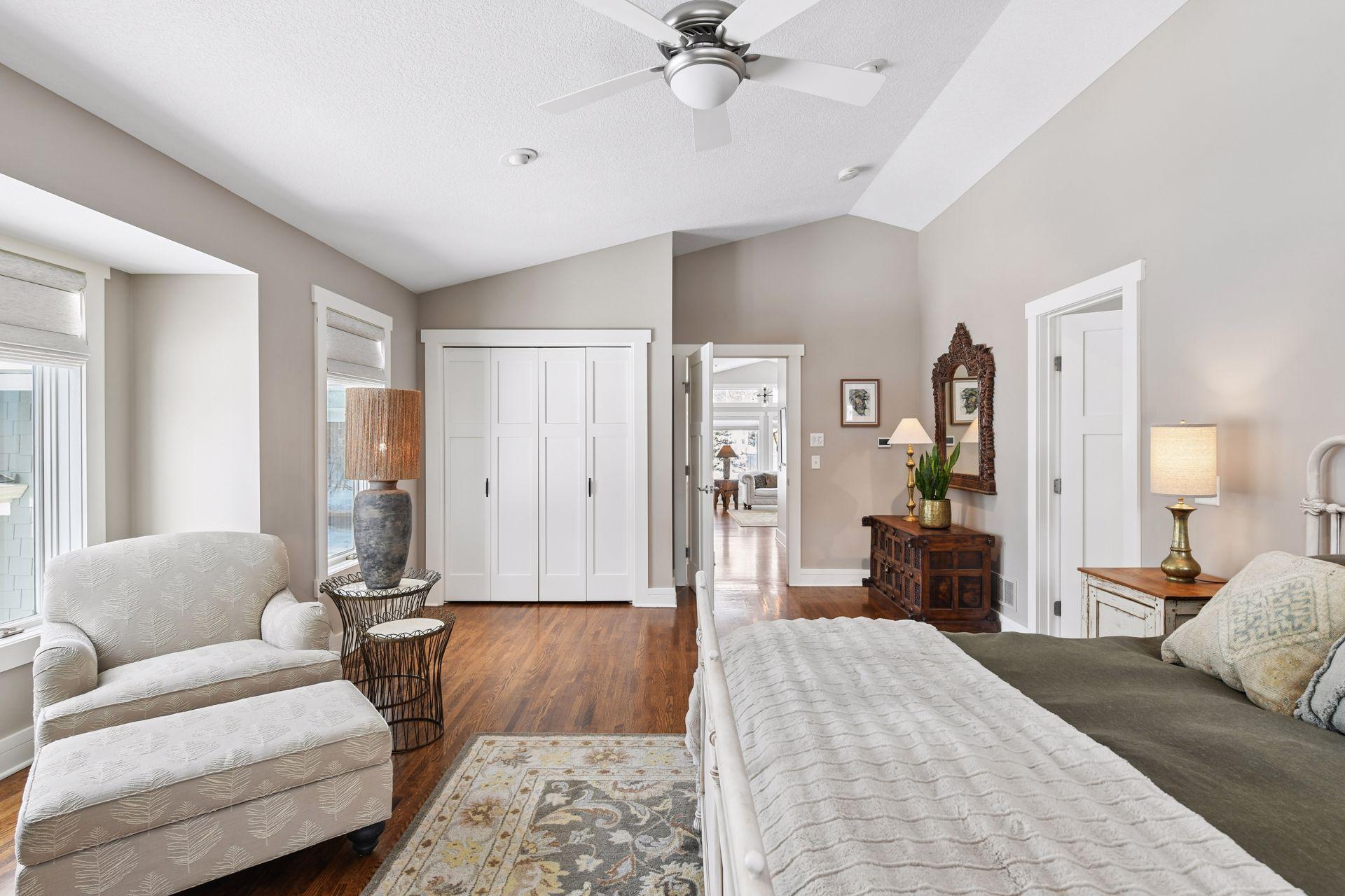 The primary bedroom offers room for a sitting area and additional storage