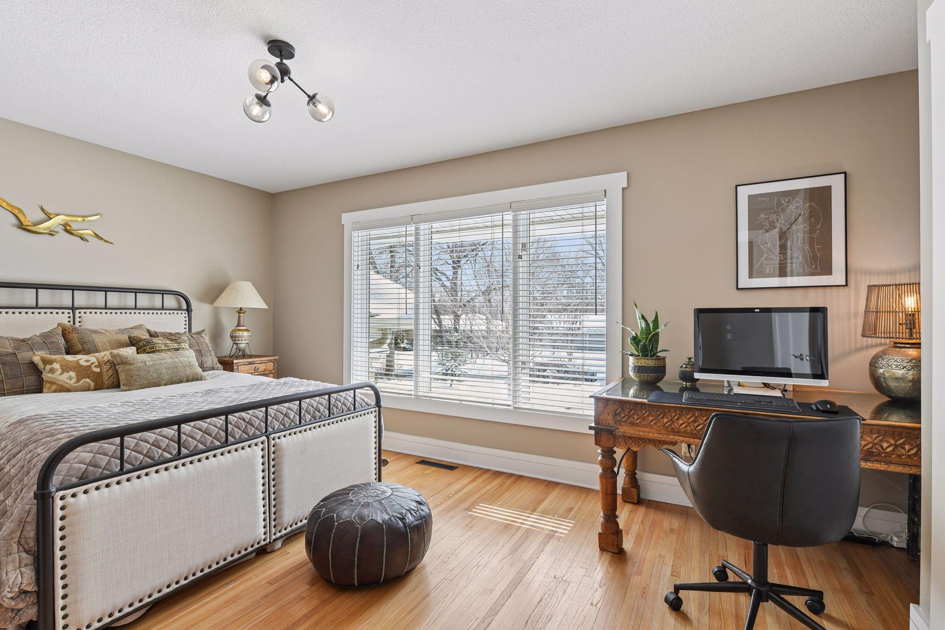 Bedroom with wood floors