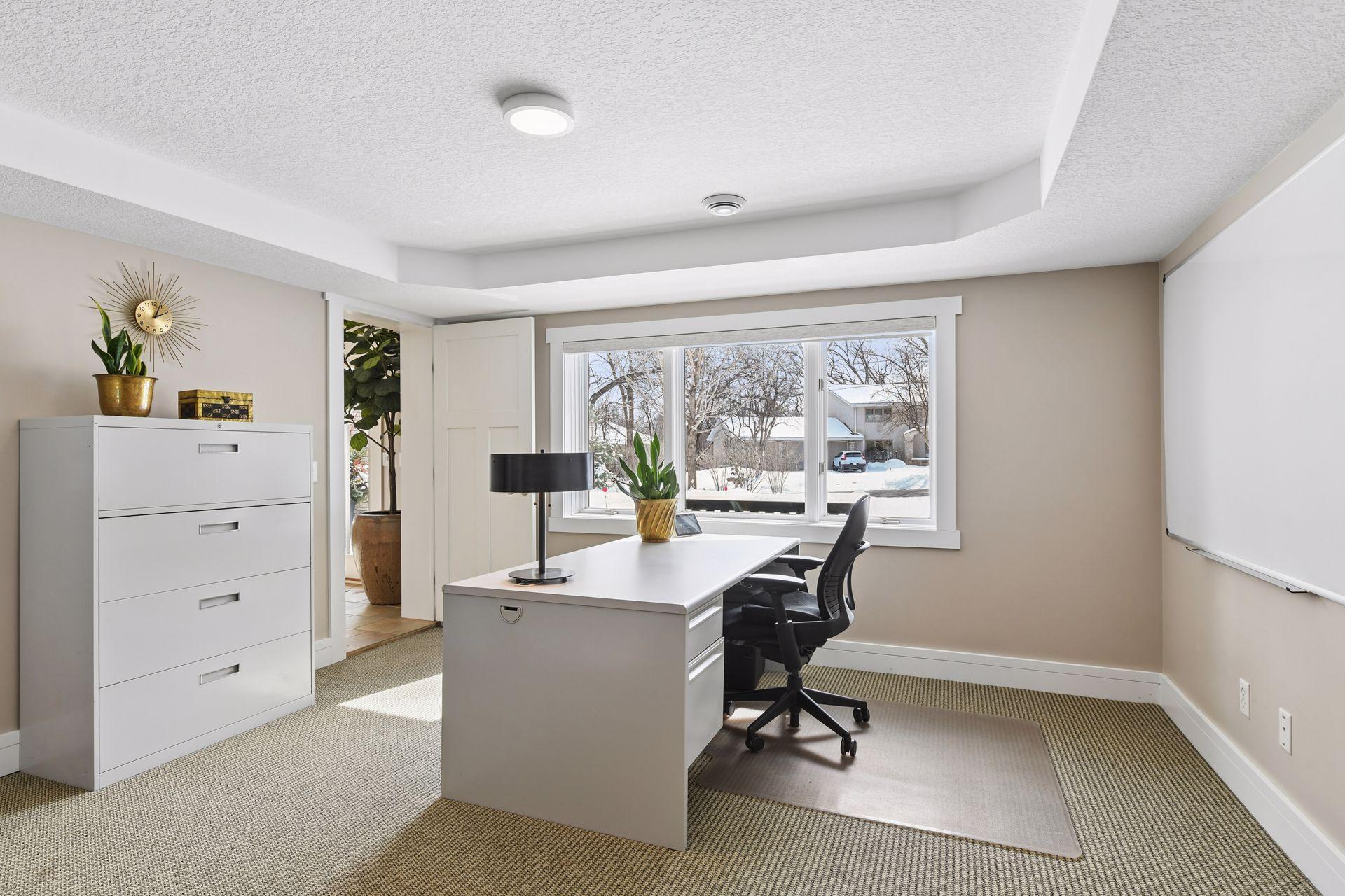 Main level office connects to the front entry-way