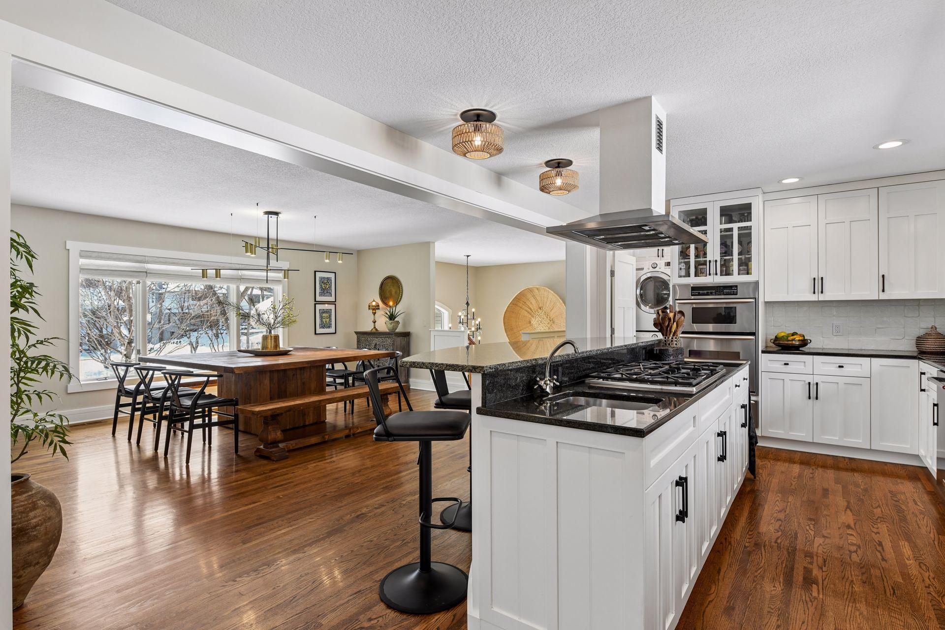 The kitchen overlooks the spacious informal dining room