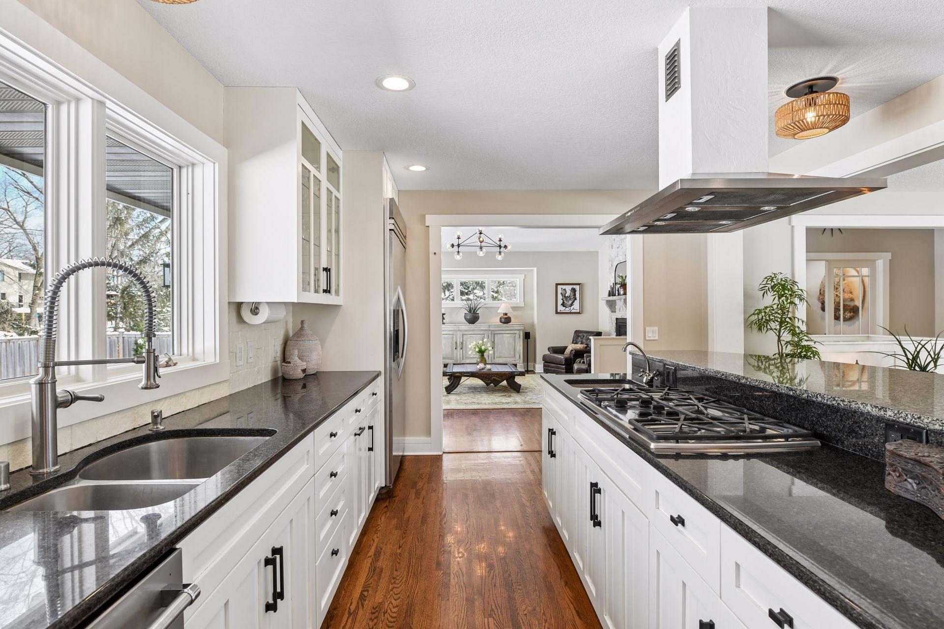 The kitchen leads into the main living room