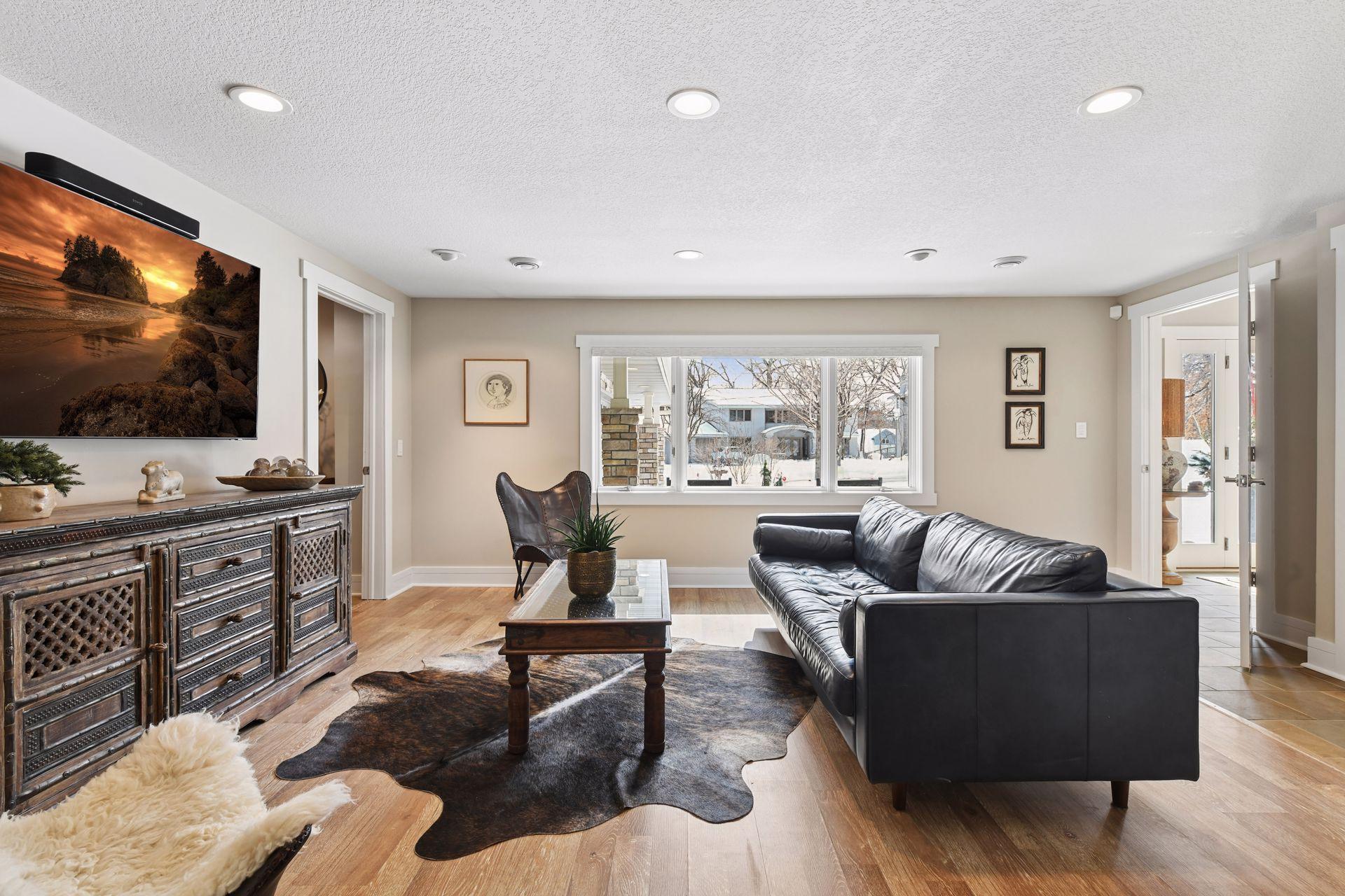 Main level in-law family room connects to the front entryway