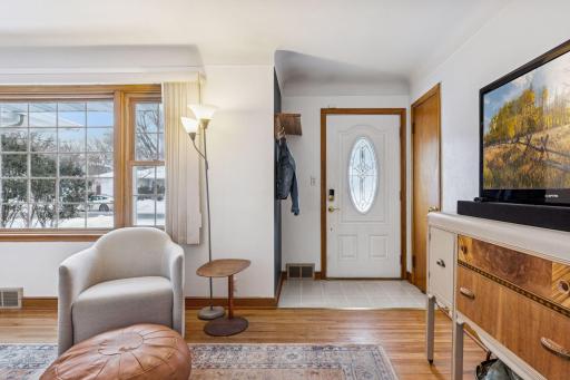 Front closet and coat hooks, convenient when you enter