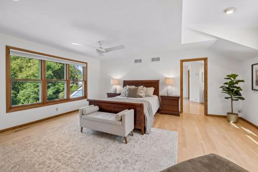 Upper-level ownerâs retreat featuring beautiful newer hardwood flooring and a peaceful, inviting atmosphere.