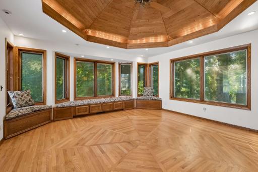 Built-in seating overlooking a serene, private backyardâperfect for relaxing and enjoying the view.
