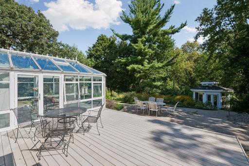 Spacious deck, perfect for relaxing, entertaining, and enjoying the beauty of nature.