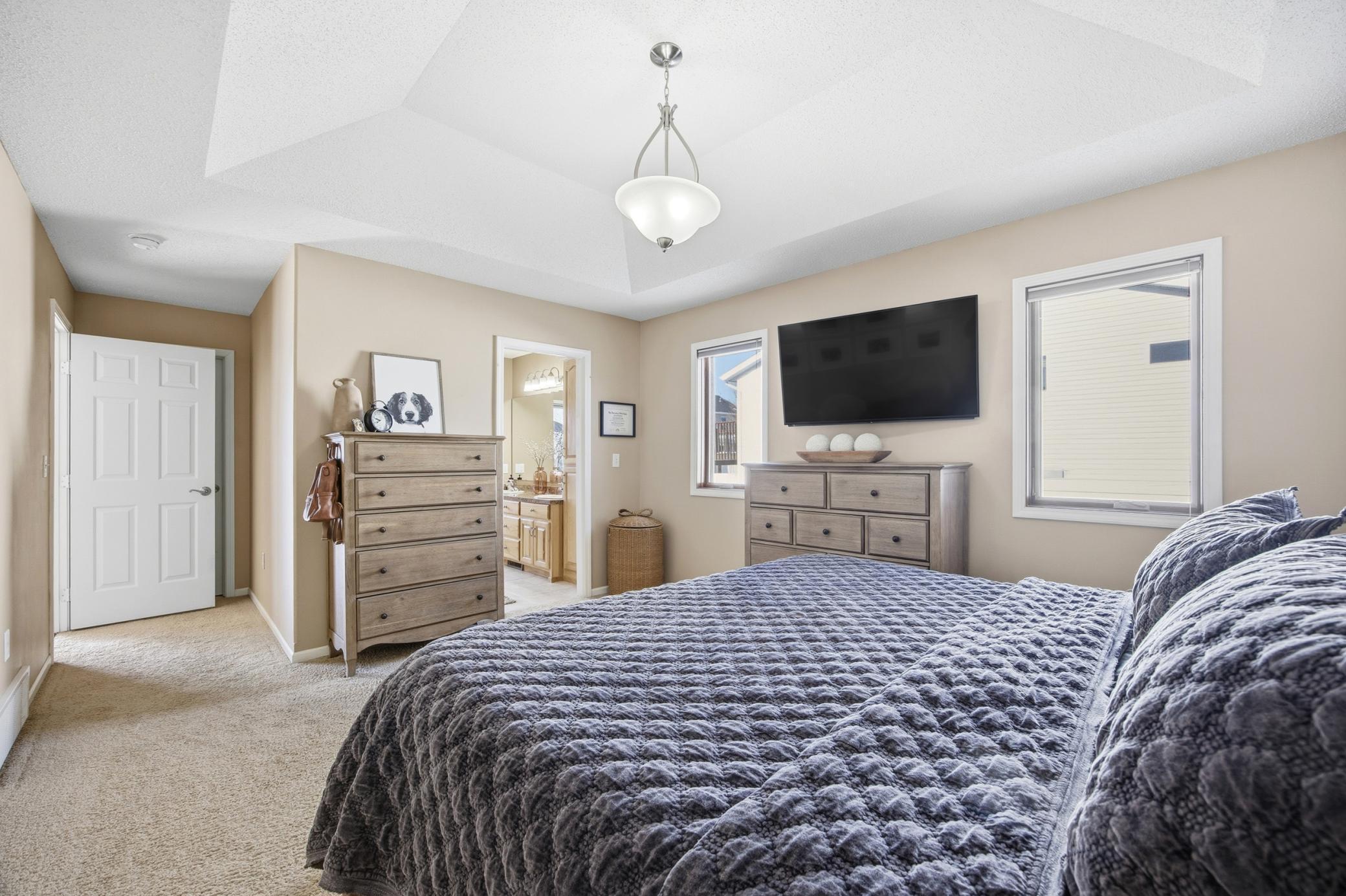 Main Floor Suite w/ Tray Ceilings & Walk IN Closet