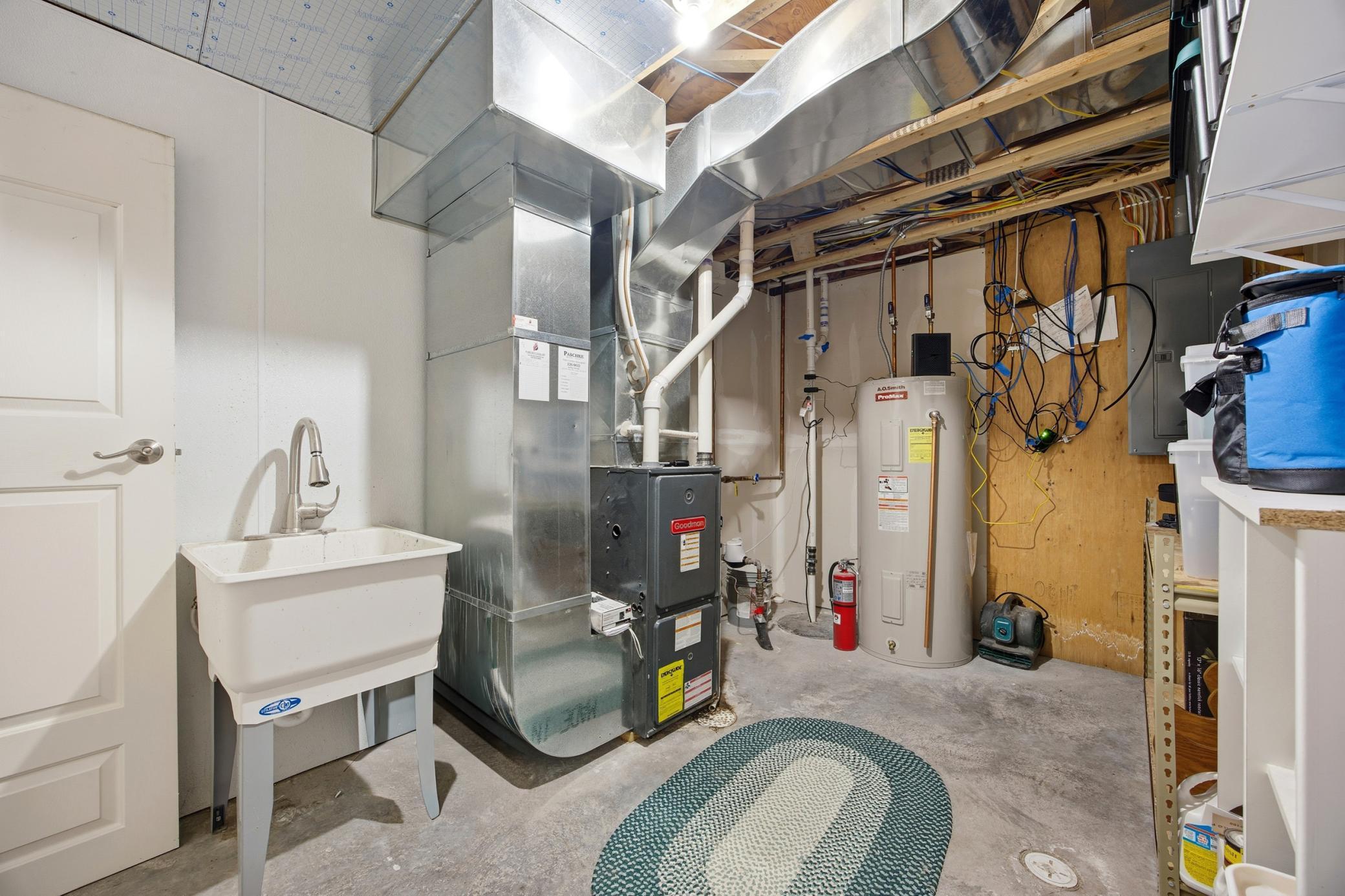 Utility Room w/ Access from Garage & Utility Sink