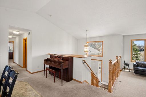 Another view of the 2 story foyer. Note: the perfect nook for an upright piano.