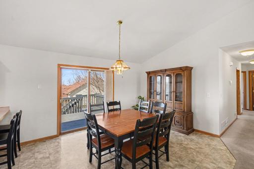 The dining area provides plenty of space for: the breakfast bar (which offers additional seating); a table for 8; and plenty of room for a large hutch -which can stay if the buyer would like.