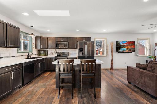 A view of the kitchen from the informal dining area.