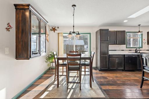 Note the tiled floor in the dining area, making after meal clean up easy!