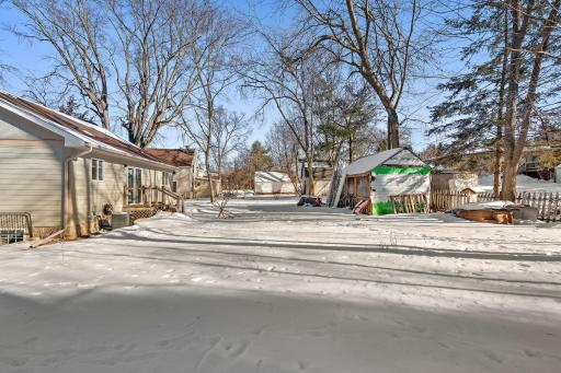 The backyard is great for outdoor hosting with yard games and/or for gardening.