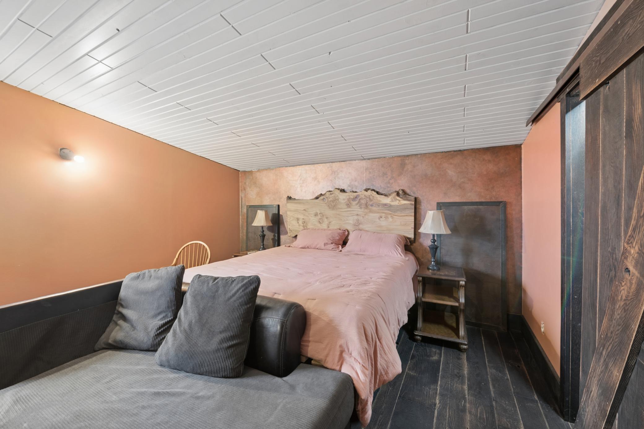 Primary bedroom with 2 walk-in-closets.