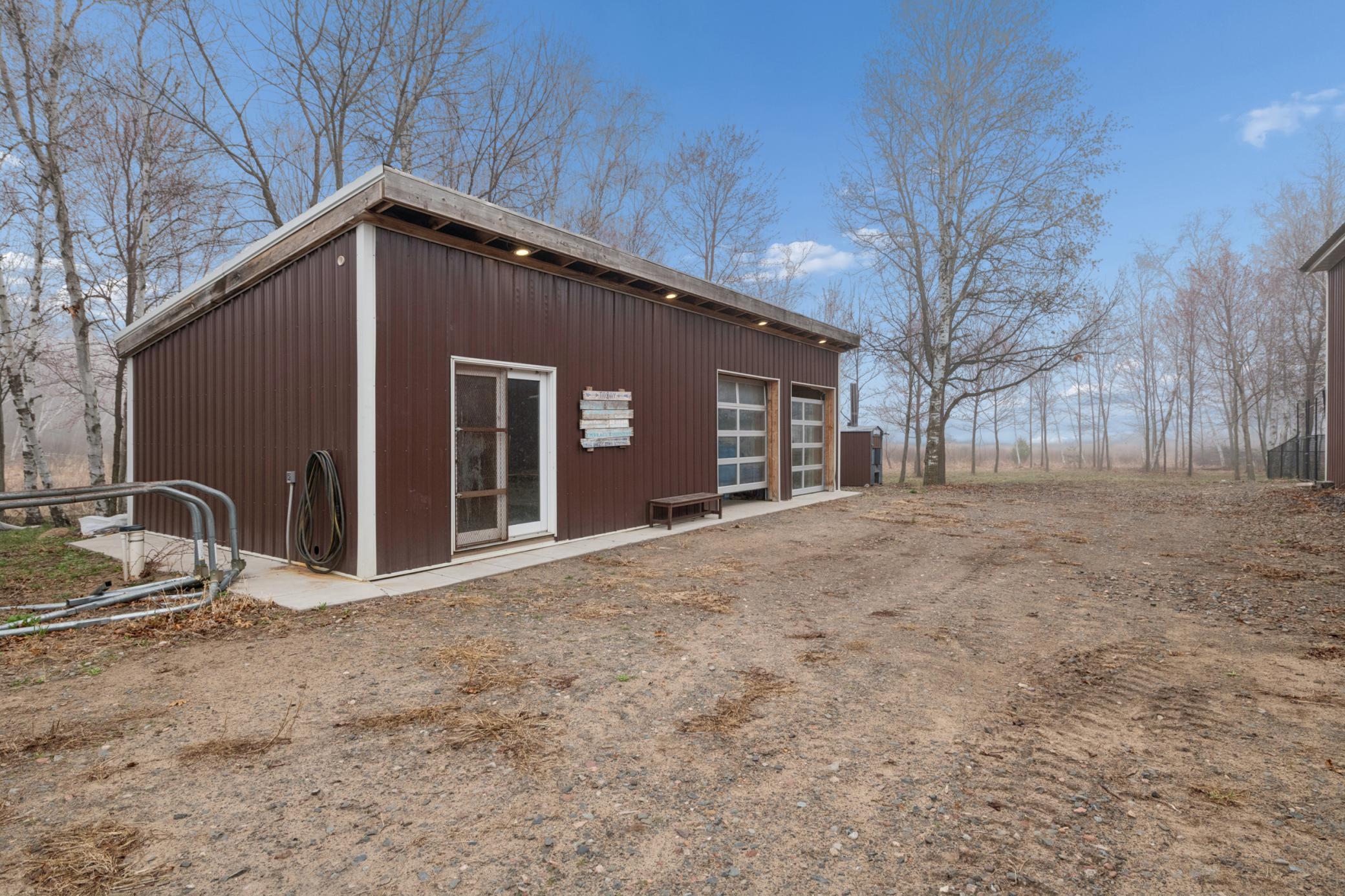Detached 2+ car garage. 1 stall has been separated for a chicken coop.
