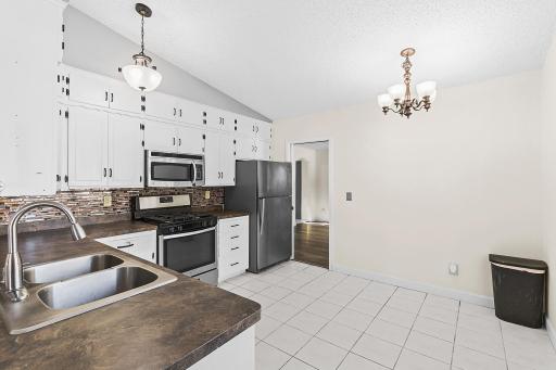 Vaulted ceilings with entry from front flex room and main living area