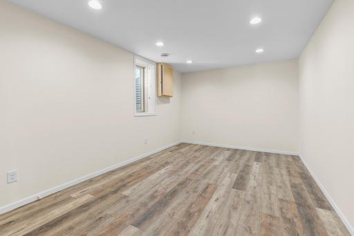 Professionally finished lower level bedroom w/egress window