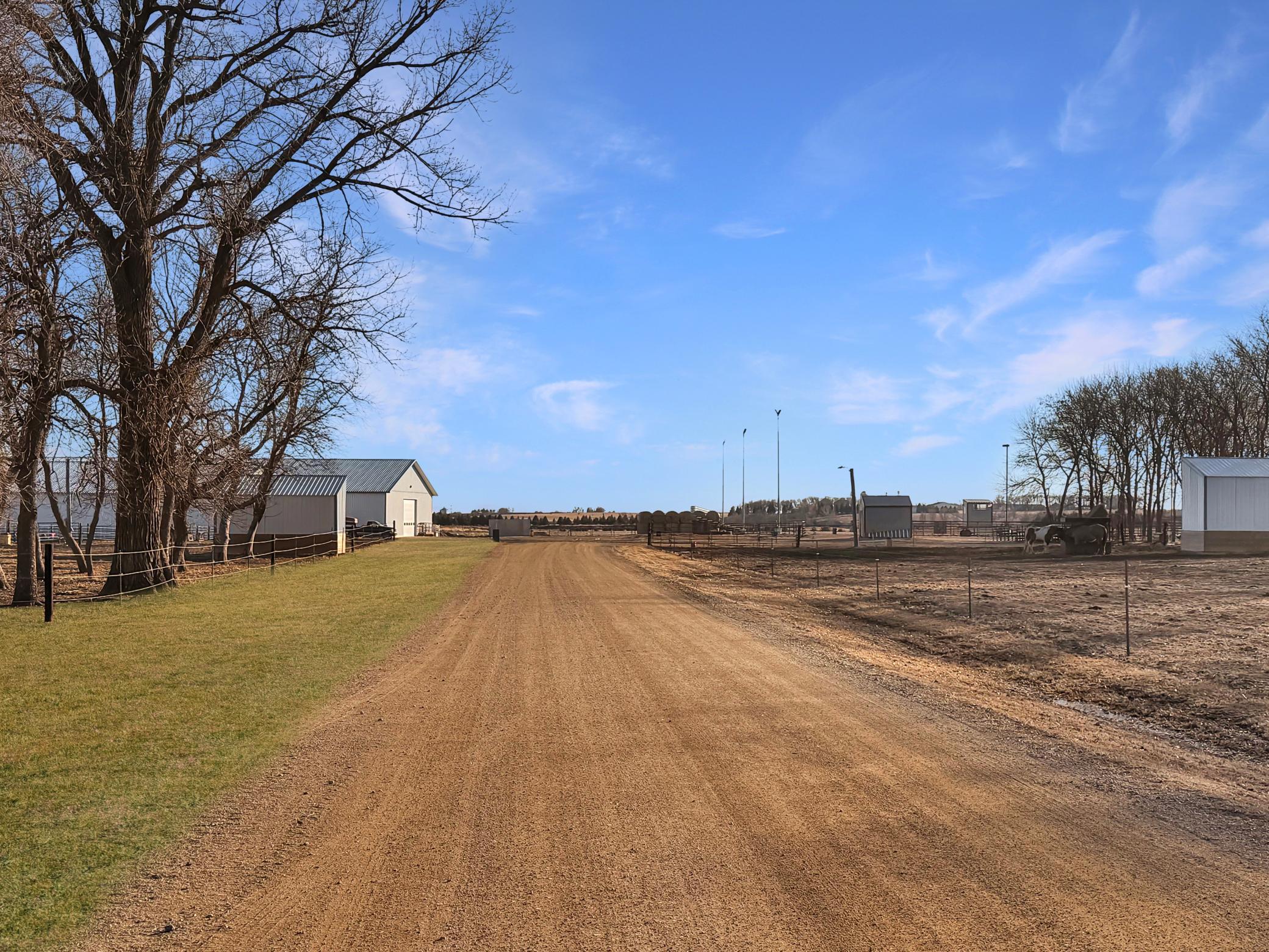 Long driveway to wide open spaces