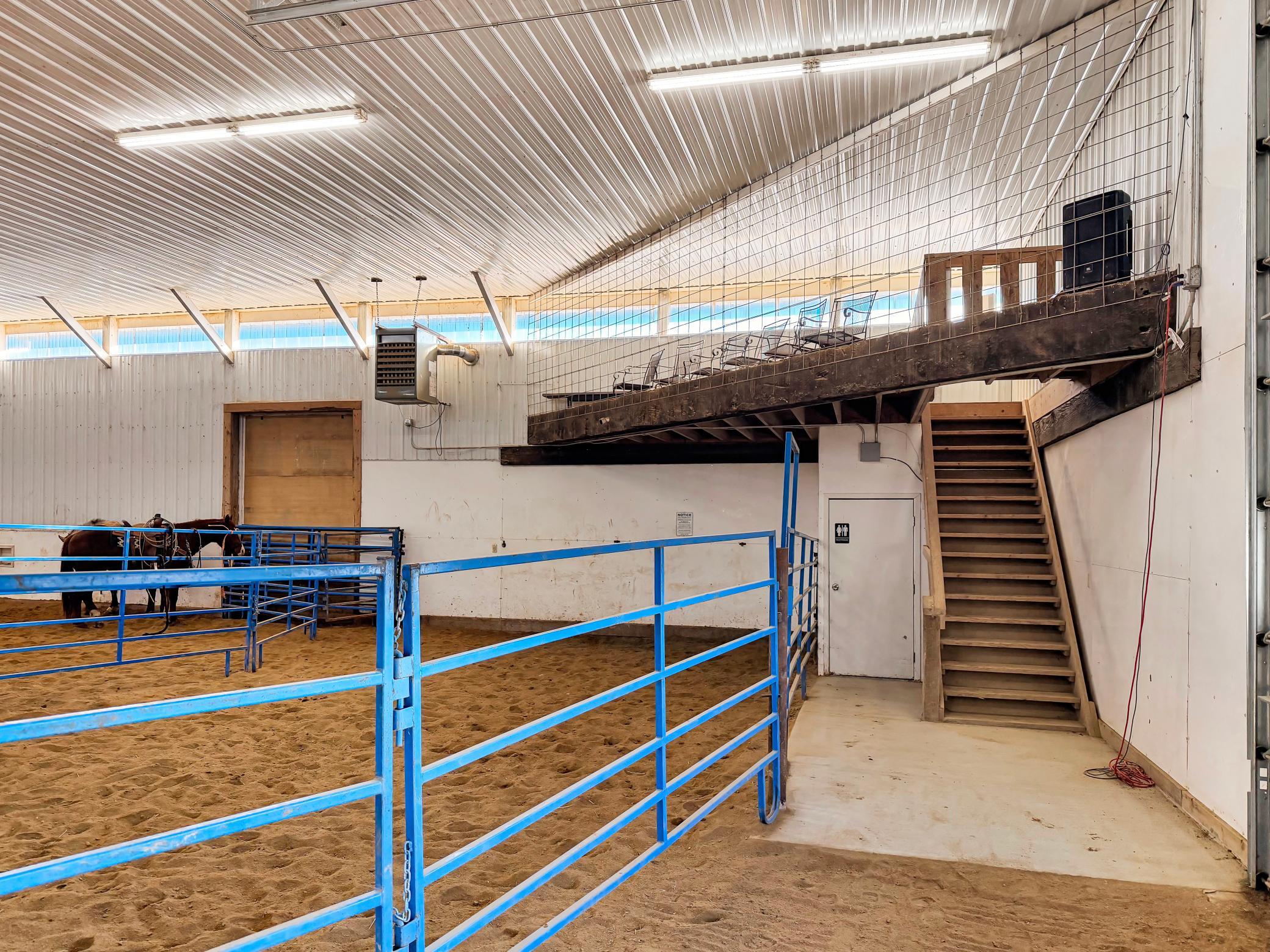 Another mezzanine for viewing (easy access to arena bathroom next to stairs, as seen in photo)