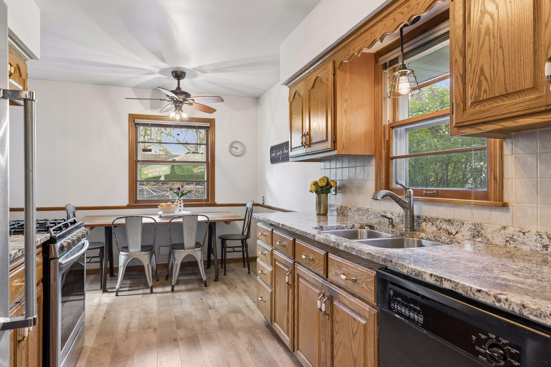 Updated granite countertops and tile backsplash