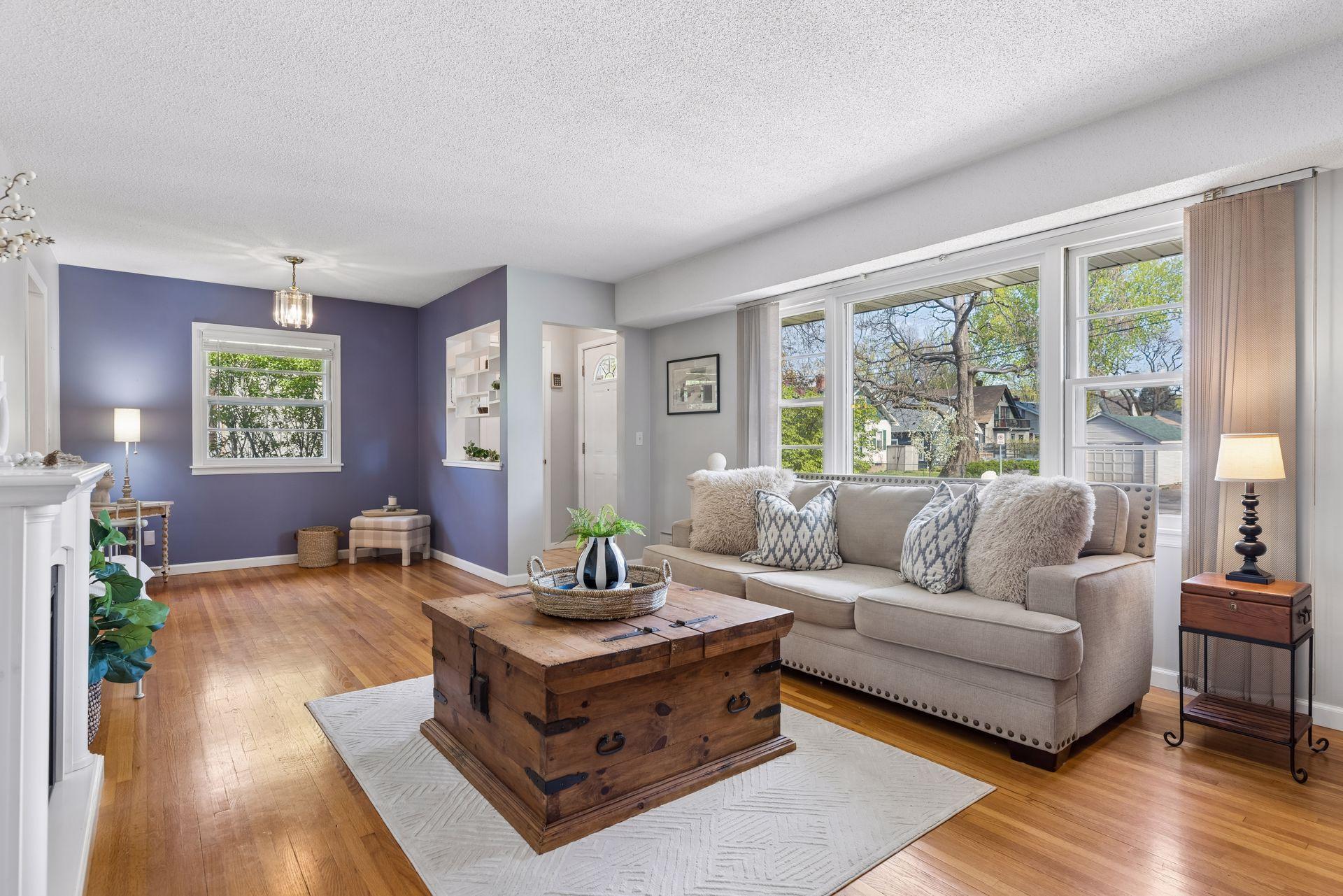 The large living room window lets in great natural light