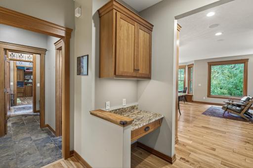 Main floor rounds out with a drop zone, mudroom and 1/2 bath